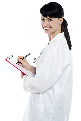 Image showing Nurse writing fresh prescription for the patient