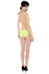 Image showing Young, fit and sexy woman in fluorescent swimsuit