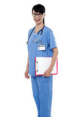 Image showing Duty doctor posing with case sheet in hand