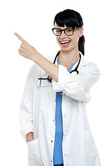 Image showing Cheerful physician pointing away, copy space area