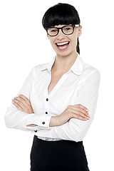 Image showing Bespectacled happy woman posing casually