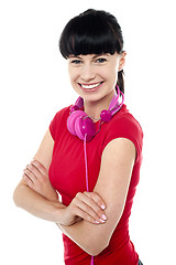 Image showing Casual music geek girl posing with confidence