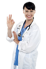Image showing Smiling medical practitioner showing perfect sign