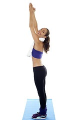 Image showing Woman standing erect and stretching hands upwards