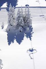 Image showing silhouette of skier on chair