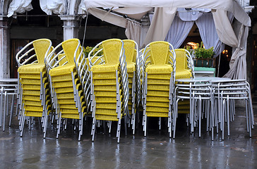 Image showing Stack of Chairs and Tables in the Fall