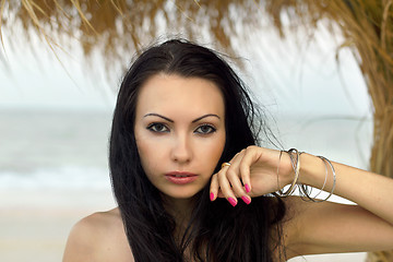 Image showing attractive young woman on the beach