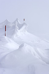 Image showing snow drift at top of mountain