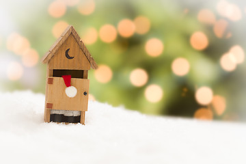 Image showing Santa in An Outhouse on Snow Over and Abstract Background