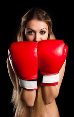 Image showing beautiful nude girl with boxing gloves