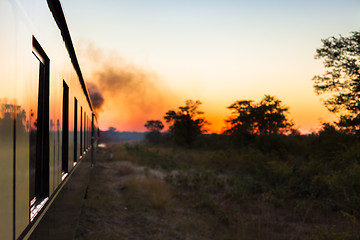 Image showing Train into sunset