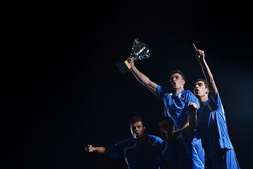 Image showing soccer players celebrating victory