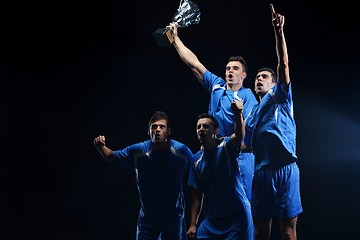 Image showing soccer players celebrating victory