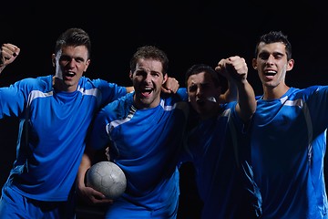 Image showing soccer players celebrating victory