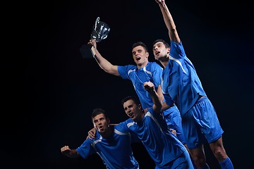 Image showing soccer players celebrating victory