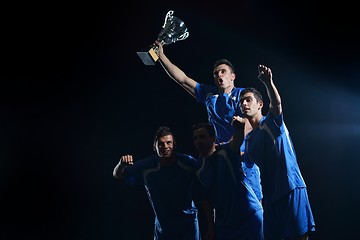 Image showing soccer players celebrating victory