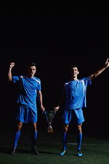 Image showing soccer players celebrating victory