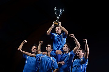 Image showing soccer players celebrating victory