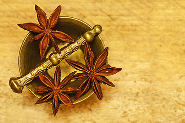 Image showing star anise with mortar