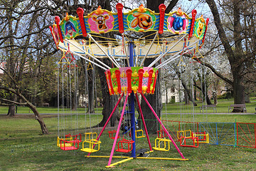 Image showing empty carousel in the garden 