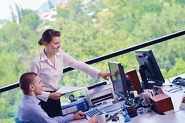 Image showing business people in a meeting at office