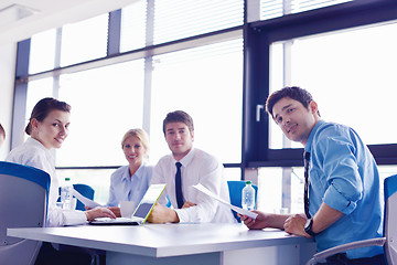 Image showing business people in a meeting at office