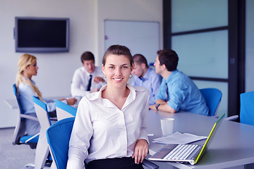 Image showing business people in a meeting at office