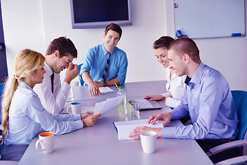 Image showing business people in a meeting at office