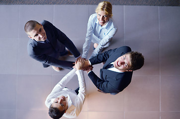 Image showing business people group joining hands