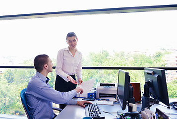 Image showing business people in a meeting at office