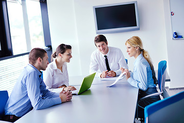 Image showing business people in a meeting at office