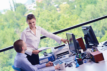 Image showing business people in a meeting at office