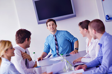 Image showing business people in a meeting at office