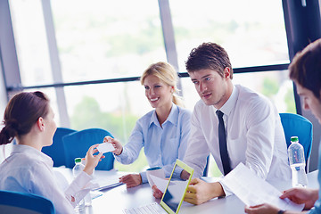 Image showing business people in a meeting at office