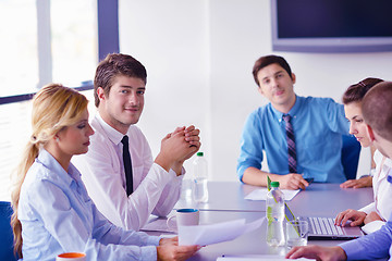 Image showing business people in a meeting at office