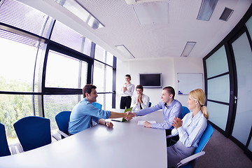 Image showing business people in a meeting at office