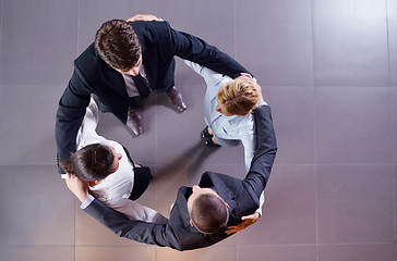 Image showing business people group joining hands