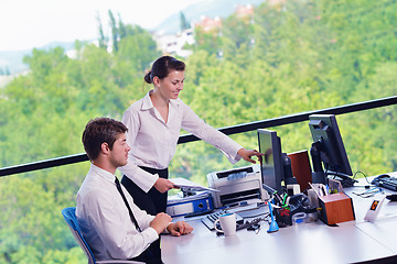 Image showing business people in a meeting at office