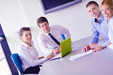 Image showing business people in a meeting at office