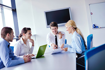 Image showing business people in a meeting at office