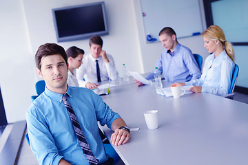 Image showing business people in a meeting at office