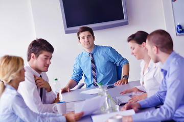 Image showing business people in a meeting at office