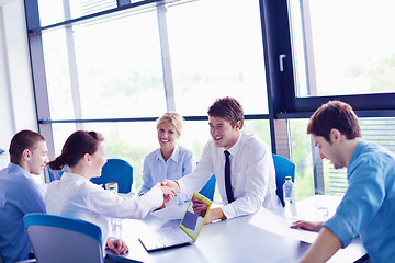 Image showing business people in a meeting at office