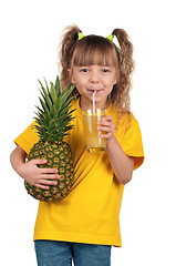 Image showing Little girl with pineapple