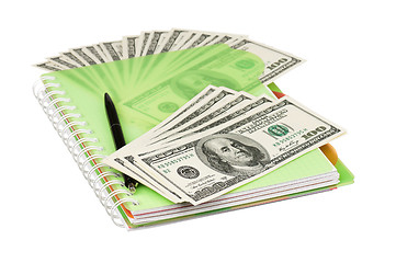 Image showing Dollars and exercise book