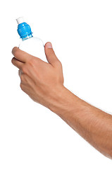 Image showing Hand with bottle of water