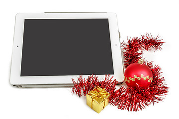 Image showing gift white tablet with Christmas ball, box and red chain