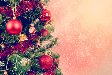 Image showing red christmas balls on tree background 