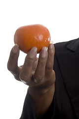 Image showing  woman with tangerine