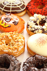 Image showing Varieties of decorated donuts
